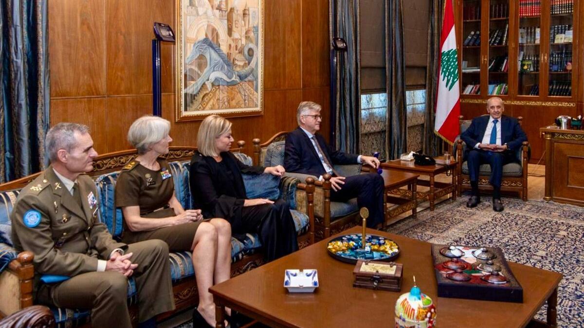 High level representatives attend a meeting.